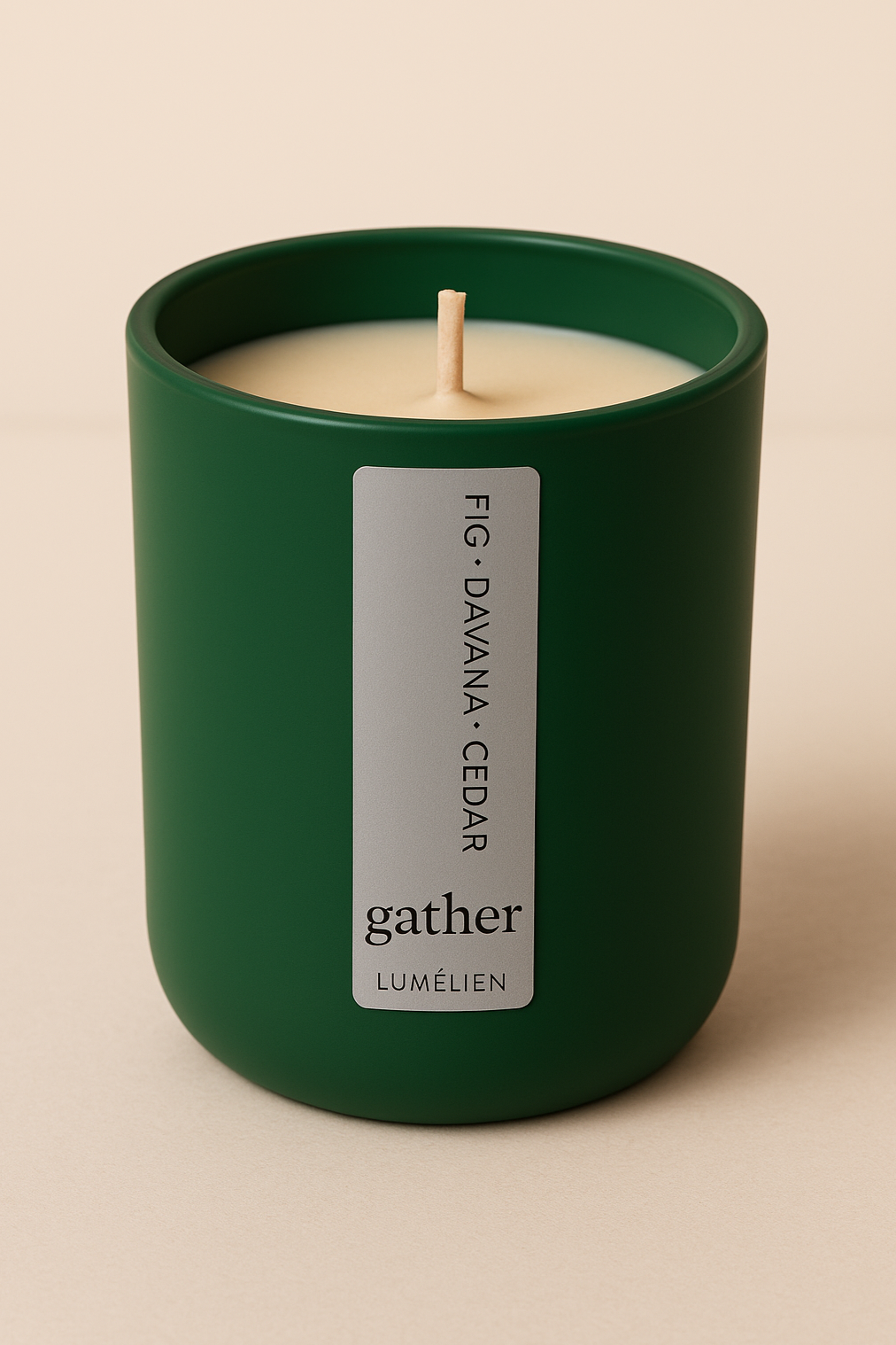 Green candle with a label on a beige background