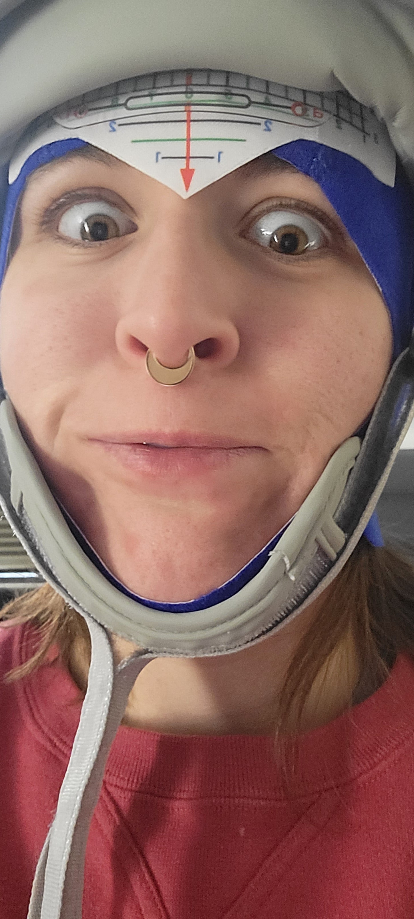 Person wearing a TMS helmet